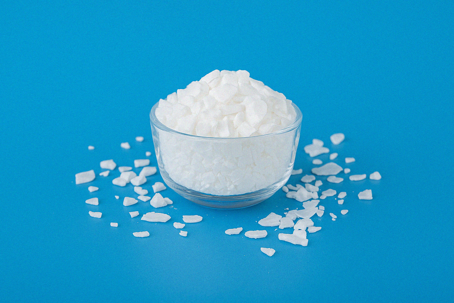 Woman Sitting behind Laptop Smiling Calcium Chloride