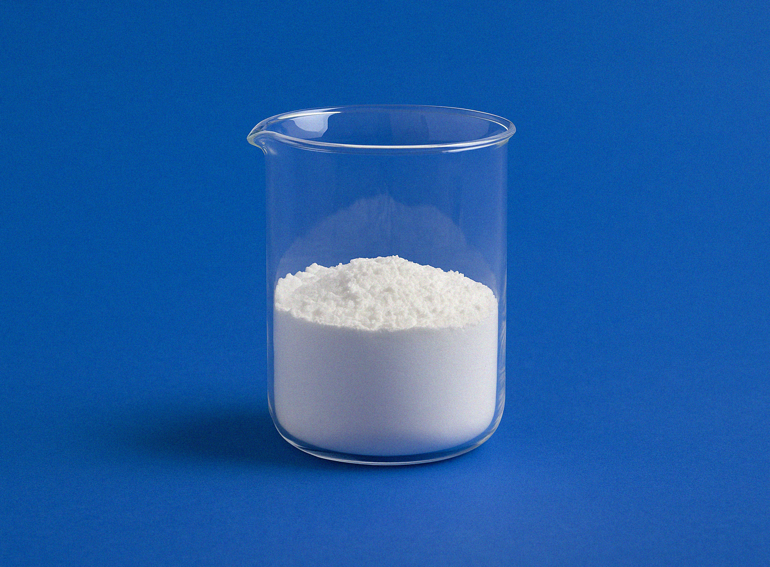 Woman Sitting behind Laptop Smiling Cyanuric Acid